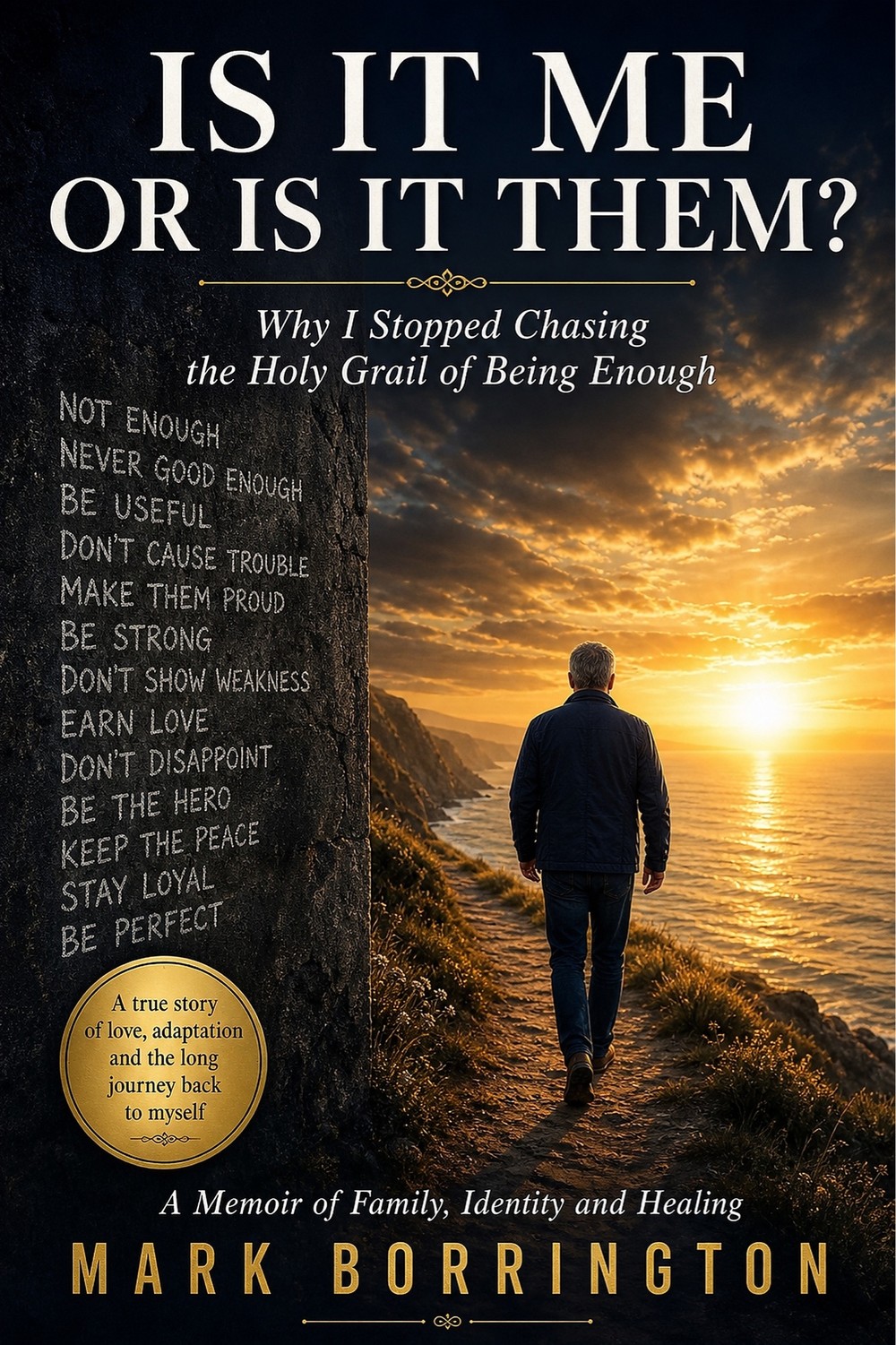 Cover of Is It Me or Is It Them? by Mark Borrington. A figure walks a coastal path towards a sunlit sea, beside a stone wall inscribed with phrases such as ‘not enough’, ‘earn love’ and ‘be perfect’.